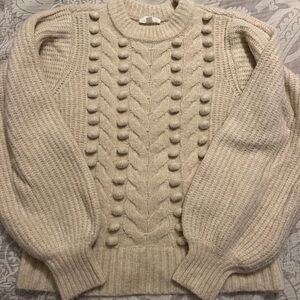 A love a from Dillards. Knit sweater in a cream color size Large